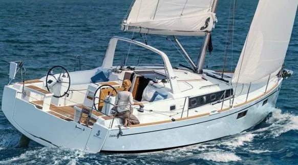 Slide: The Image of 2017 Beneteau Oceanis 38.1 sailboat deck with winch and rope detail. - 11