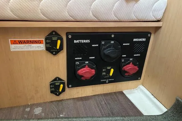 Slide: The Image of 2017 Beneteau Oceanis 38.1 yacht docked, featuring a spacious deck and sales sign. - 15