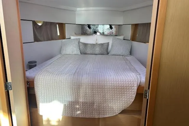 Slide: The Image of 2017 Beneteau Oceanis 38.1 yacht cockpit with wooden deck and steering wheel. - 21