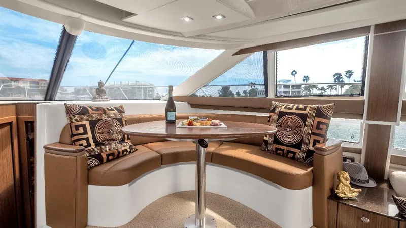 Slide: The Image of Luxurious interior of 2016 Meridian 391 Sedan yacht with elegant seating and table. - 13