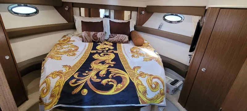 Slide: The Image of Luxurious bedroom in 2016 Meridian 391 Sedan yacht with elegant bedding. - 14