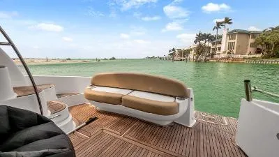Slide: The Image of 2016 Meridian 391 Sedan yacht with scenic waterfront view. - 8