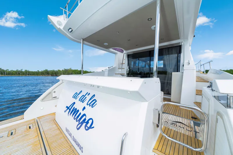 Slide: The Image of Azimut 50 Fly 2018 yacht on water, featuring elegant deck and sleek design. - 10