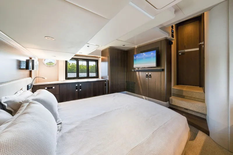 Slide: The Image of Luxurious bedroom interior of 2018 Azimut 50 Fly yacht with modern amenities. - 27