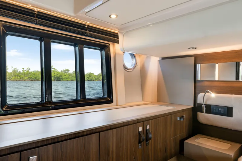 Slide: The Image of Luxurious interior of 2018 Azimut 50 Fly yacht with scenic water view. - 28
