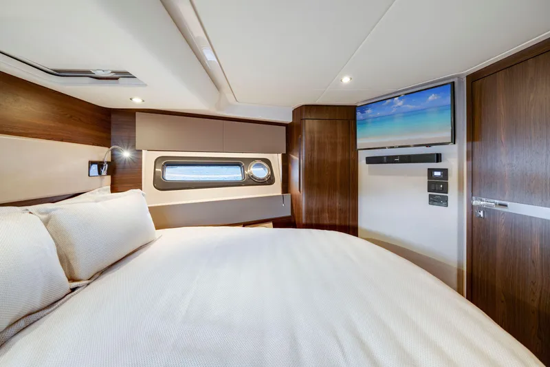 Slide: The Image of Luxurious bedroom interior of 2018 Azimut 50 Fly yacht with modern amenities. - 32