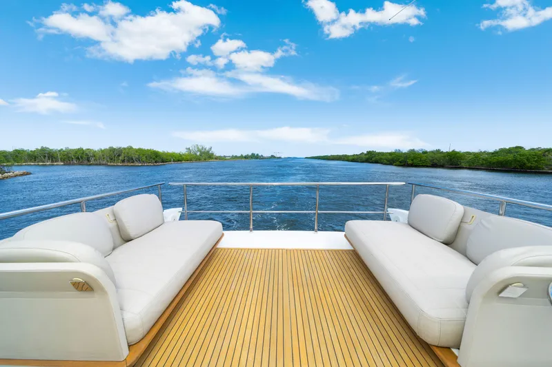 Slide: The Image of Luxurious Azimut 50 Fly yacht deck with scenic waterway view, 2018 model. - 36