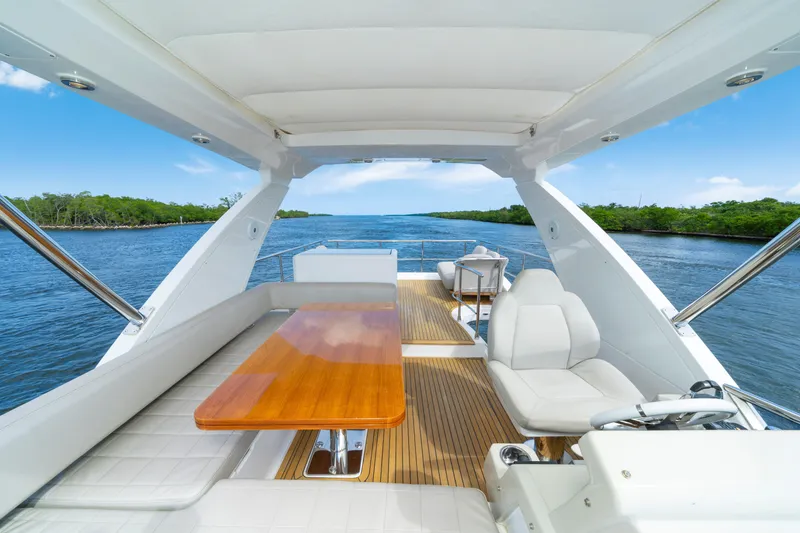 Slide: The Image of Luxurious 2018 Azimut 50 Fly yacht interior with scenic waterway view. - 40