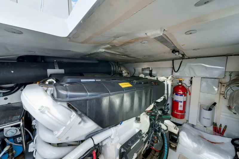 Slide: The Image of Engine room of 2018 Azimut 50 Fly yacht, featuring machinery and safety equipment. - 47