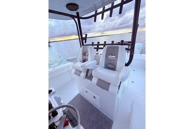 Slide: The Image of 2019 Freeman 34 boat interior with luxury seating and ocean view. - 38