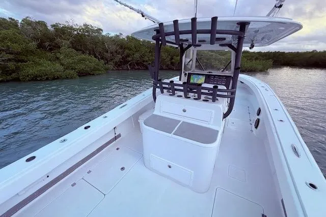 Slide: The Image of 2019 Freeman 34 boat on calm water near lush green mangroves. - 54
