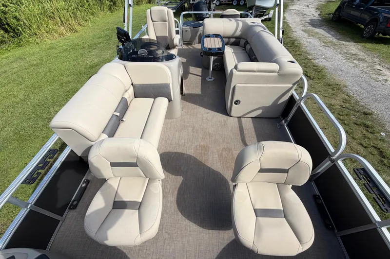 Slide: The Image of 2023 Sun Tracker Fishin' Barge 20 DLX interior with spacious seating and modern design. - 38