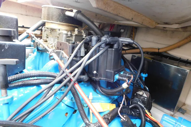 Slide: The Image of Engine compartment of a 1996 Chris-Craft 340 Crowne boat, showcasing wiring and components. - 17