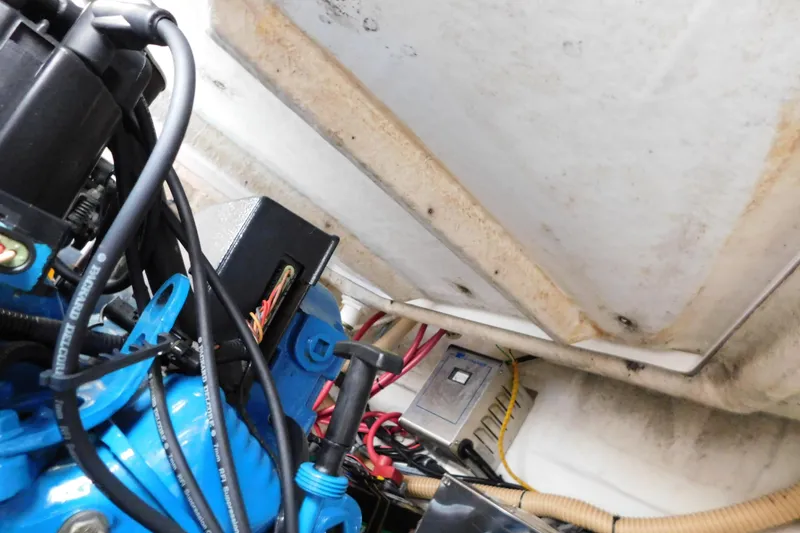 Slide: The Image of Engine compartment of a 1996 Chris-Craft 340 Crowne boat, showing wiring and components. - 18