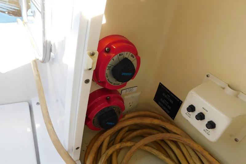 Slide: The Image of Electrical panel and switches on a 1996 Chris-Craft 340 Crowne boat. - 21