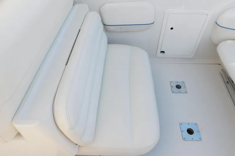 Slide: The Image of White seating area on 1996 Chris-Craft 340 Crowne boat interior. - 27