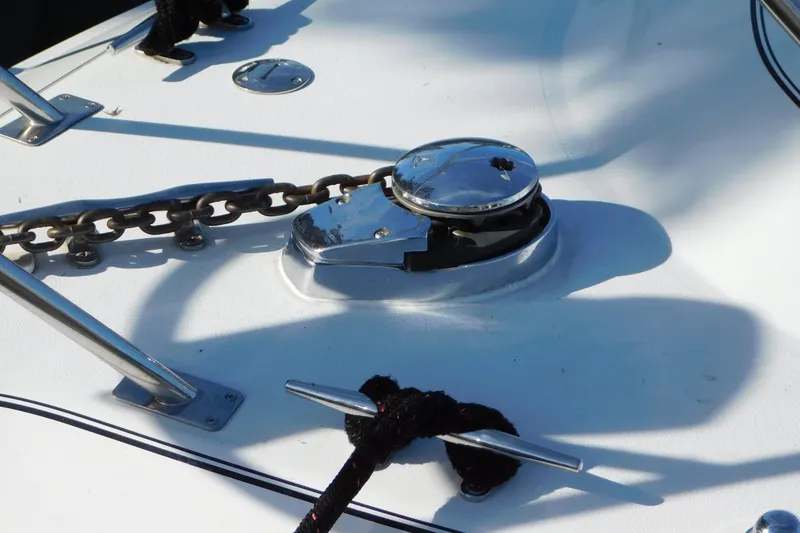 Slide: The Image of 1996 Chris-Craft 340 Crowne boat deck with anchor chain and cleat. - 4