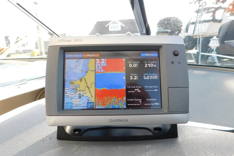 Slide: The Image of Garmin GPSmap 740s on 1996 Chris-Craft 340 Crowne boat dashboard, displaying navigation data. - 43