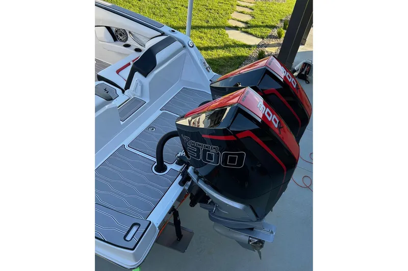 Slide: The Image of 2023 Sunsation 32 CCX boat with twin Mercury Racing 300 outboard engines. - 11