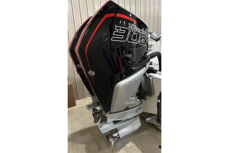 Slide: The Image of 2023 Sunsation 32 CCX boat with powerful black and red outboard engines. - 13