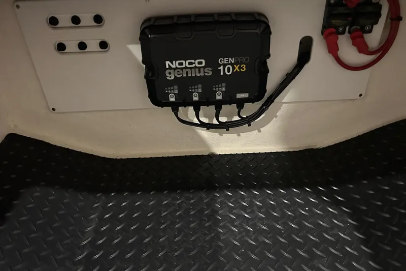 Slide: The Image of 2023 Sunsation 32 CCX featuring NOCO Genius GENPRO 10X3 battery charger installation. - 15