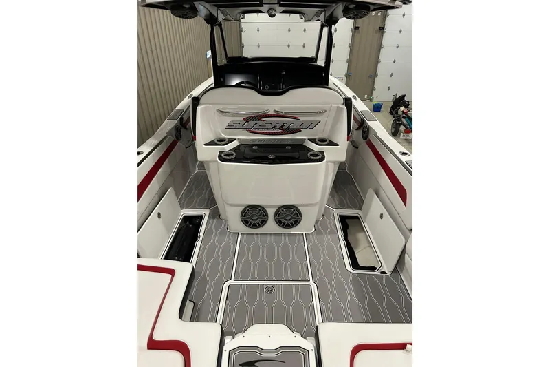 Slide: The Image of 2023 Sunsation 32 CCX boat interior with sleek design, red accents, and modern features. - 4