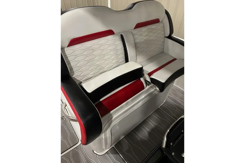 Slide: The Image of 2023 Sunsation 32 CCX boat seating with red, black, and white upholstery design. - 7