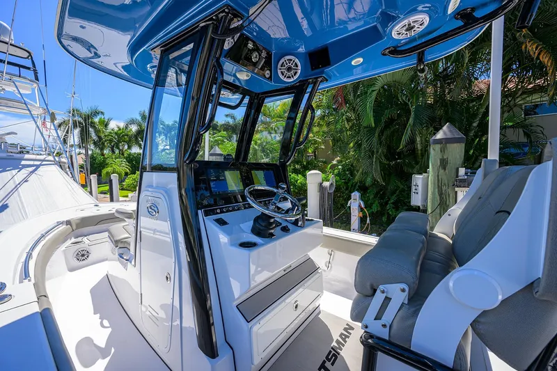 Slide: The Image of 2023 Sportsman Masters 247OE Bay Boat interior with modern helm and seating. - 15