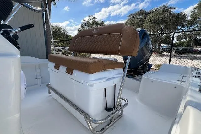 Slide: The Image of 2026 Key West 1720 Center Console boat with cushioned seating and storage. - 3
