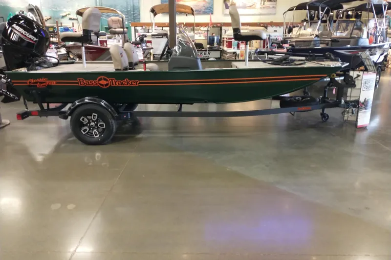 Slide: The Image of 2026 Tracker Bass Tracker Classic Limited boat on display in showroom. - 5