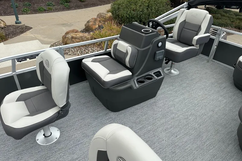 Slide: The Image of 2026 Sun Tracker Bass Buggy 16 XL Select interior with gray and white seating. - 4