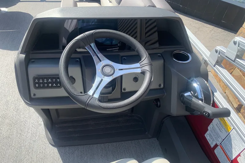 Slide: The Image of Steering console of 2026 Sun Tracker Fishin' Barge 22 DLX pontoon boat. - 9