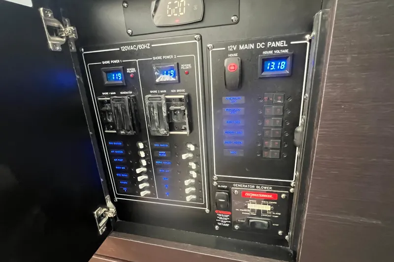 Slide: The Image of Electrical control panel on a 2026 Boston Whaler 350 Realm boat. - 21