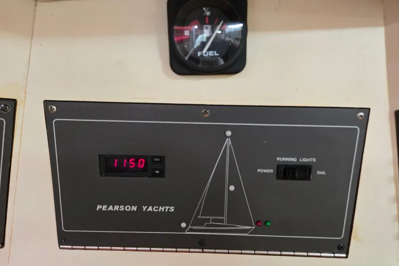 Slide: The Image of Control panel of a 1989 Pearson 37-2 yacht with fuel gauge and digital display. - 18