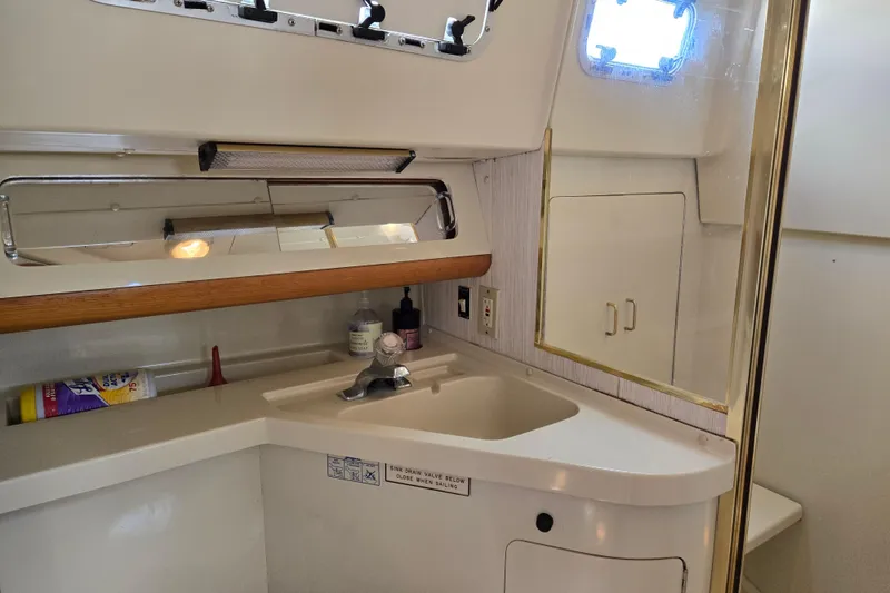 Slide: The Image of Interior of 1989 Pearson 37-2 yacht bathroom with sink and mirror. - 36