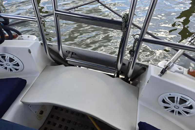 Slide: The Image of Cockpit of 1989 Pearson 37-2 sailboat with stainless steel ladder and speakers. - 5