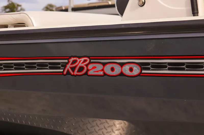 Slide: The Image of 2022 Ranger RB200 boat logo with red and black detailing. - 10