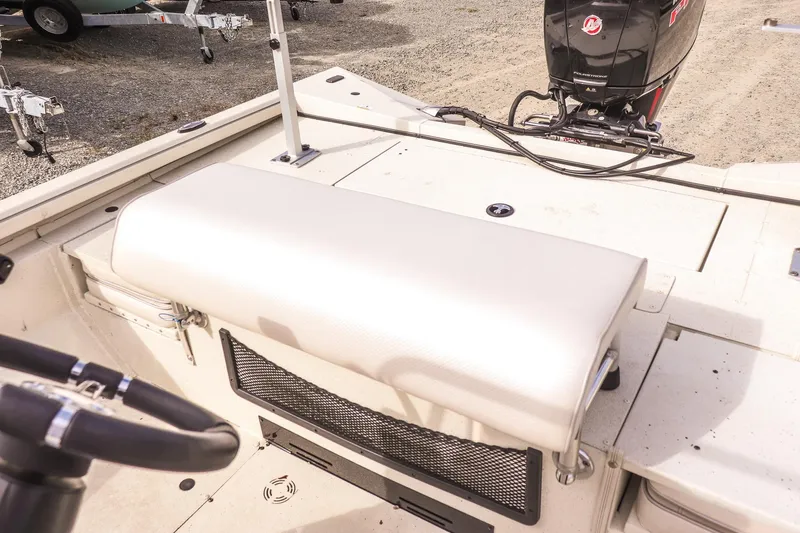 Slide: The Image of 2022 Ranger RB200 boat interior with steering wheel and outboard motor. - 14