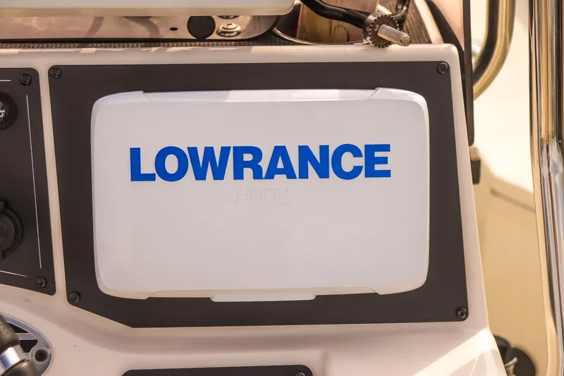 Slide: The Image of Lowrance device on 2022 Ranger RB200 boat dashboard, close-up view. - 16