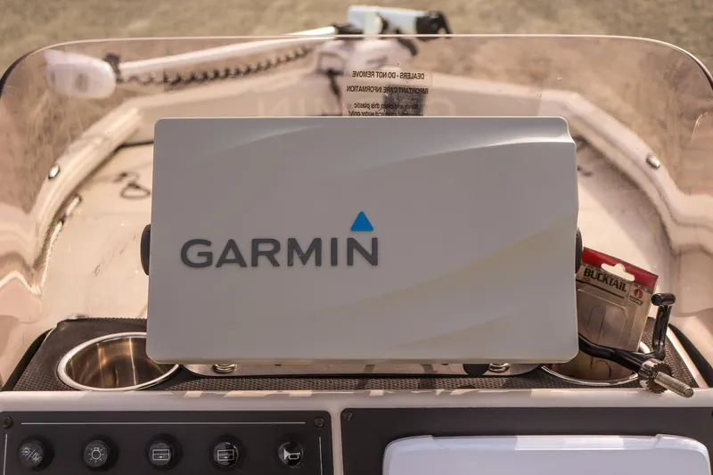 Slide: The Image of Garmin device on 2022 Ranger RB200 boat dashboard, featuring control panel and accessories. - 17