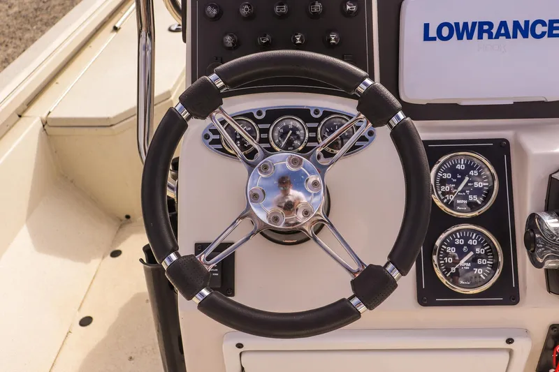 Slide: The Image of Steering wheel and dashboard of 2022 Ranger RB200 boat with Lowrance display. - 18