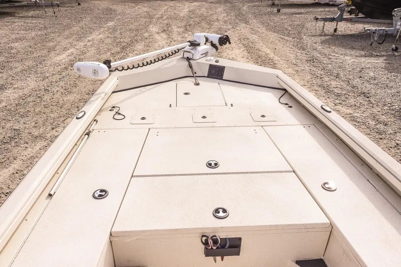 Slide: The Image of 2022 Ranger RB200 boat deck with storage compartments and trolling motor. - 20