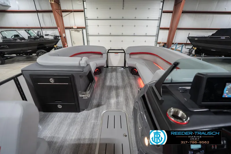 Slide: The Image of Interior of 2026 Bennington 22 ML pontoon boat with modern seating and ambient lighting. - 20