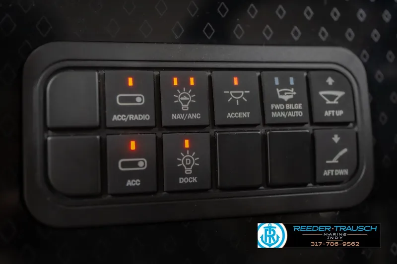 Slide: The Image of Control panel of a 2026 Bennington 22 ML boat with various function buttons. - 41