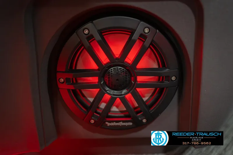Slide: The Image of Red illuminated speaker on 2026 Bennington 22 ML boat, featuring Rockford Fosgate audio system. - 50