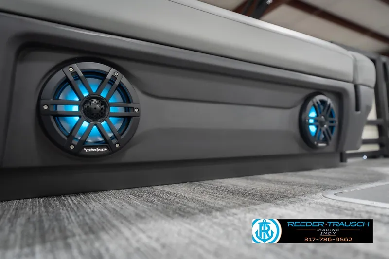 Slide: The Image of 2026 Bennington 22 ML boat interior with illuminated Rockford Fosgate speakers. - 51