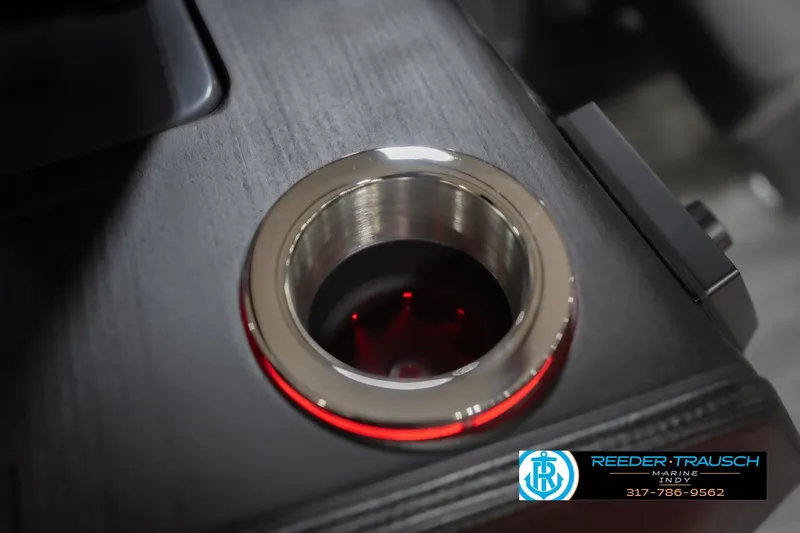 Slide: The Image of Illuminated cup holder on 2026 Bennington 22 ML boat, featuring sleek design and red lighting. - 52