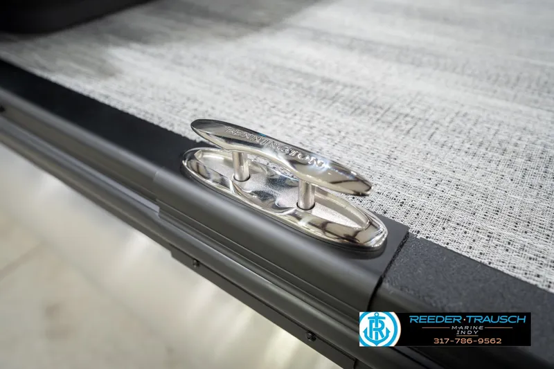 Slide: The Image of Close-up of a 2026 Bennington 22 ML boat cleat on textured surface. - 60