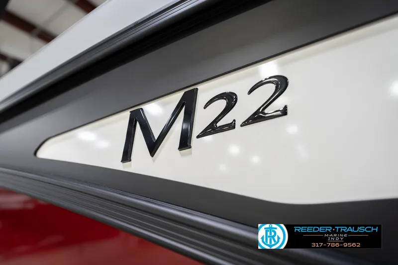 Slide: The Image of 2026 Bennington 22 ML boat model emblem with dealership logo. - 62