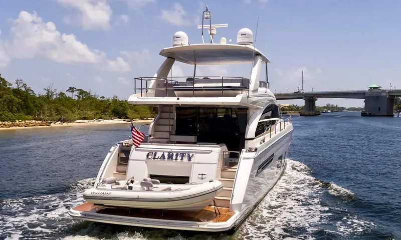Slide: The Image of Princess Flybridge 68 Yacht with city skyline, 2015 model. - 3